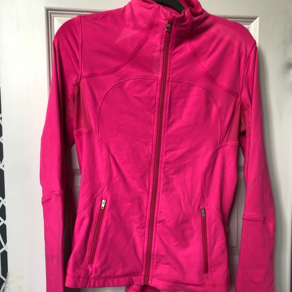 Hot pink LuluLemon zip up jacket.